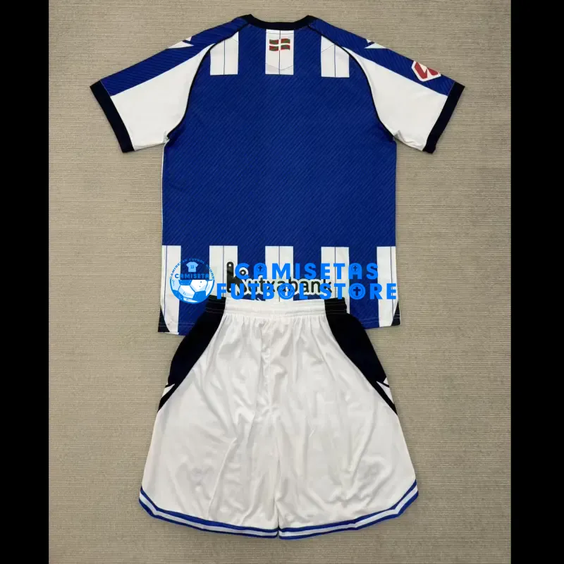 Camiseta Real Sociedad 1ª Equipación 2025/2026 Azul/Blanco Niño Kit con Parche La Liga - Imagen 2